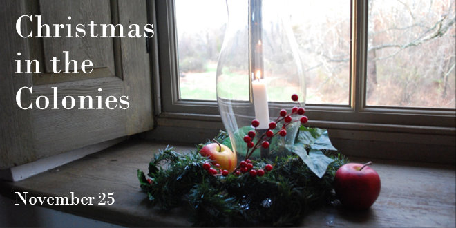 Photograph of a candle in the window of the Keith House with apples and greenery surrounding it. The text reads "Christmas in the Colonies November 25."